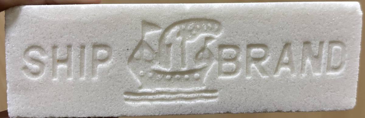 Ship Brand emboss close-up