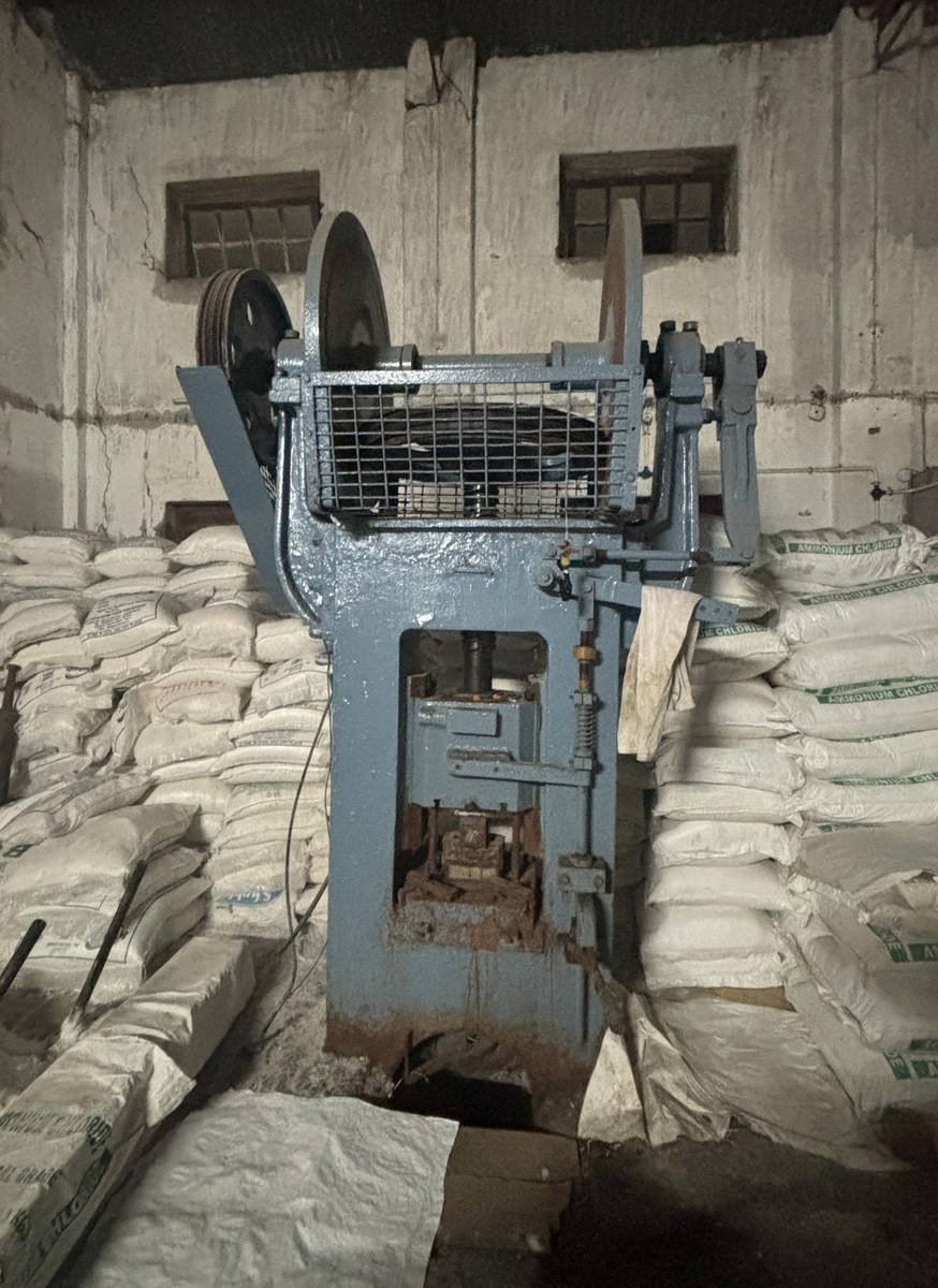 Blue press between stacks